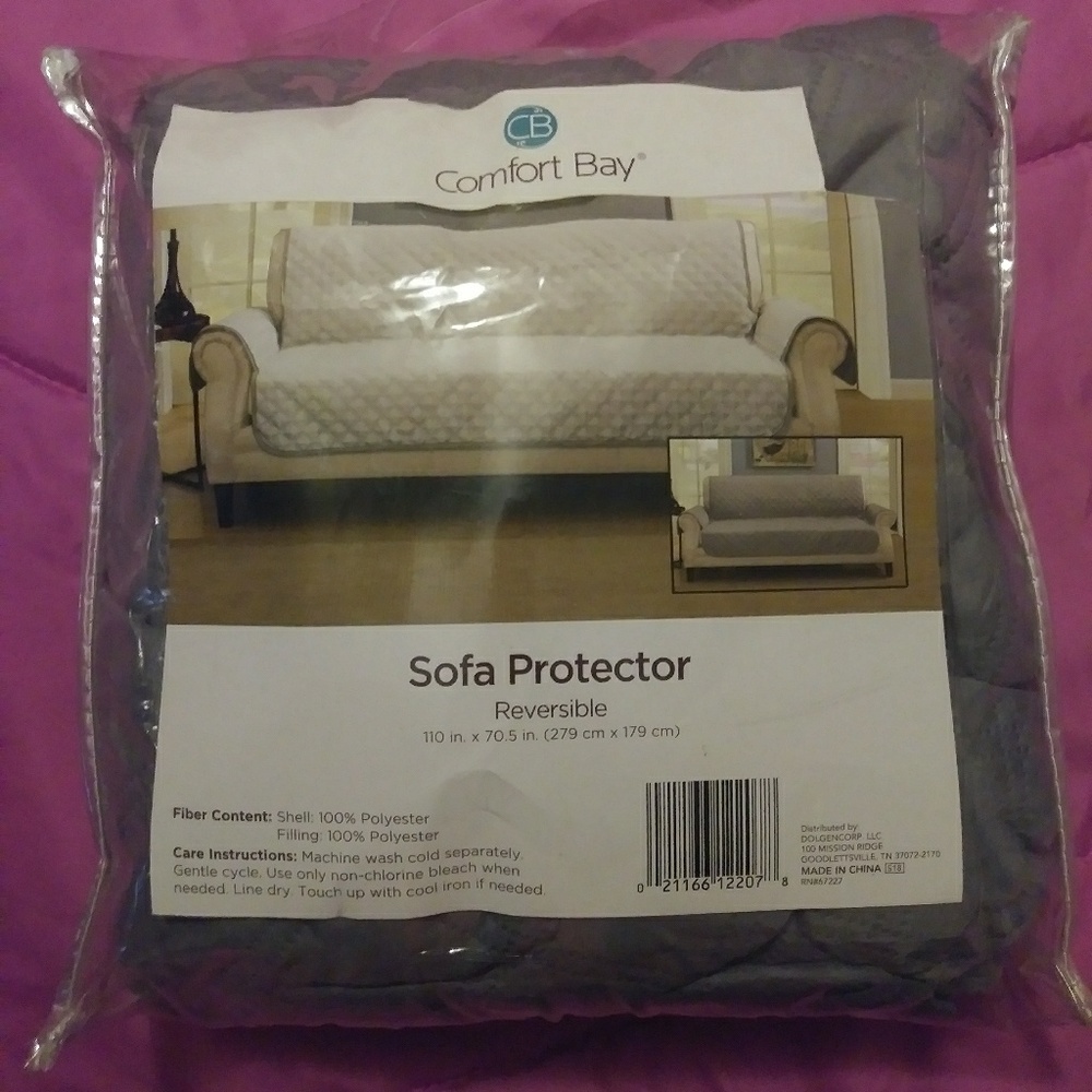 NWOT. Reversible grey sofa protector.
